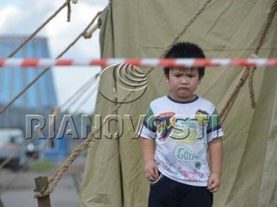 В лагере мигрантов. Фото РИА "Новости"